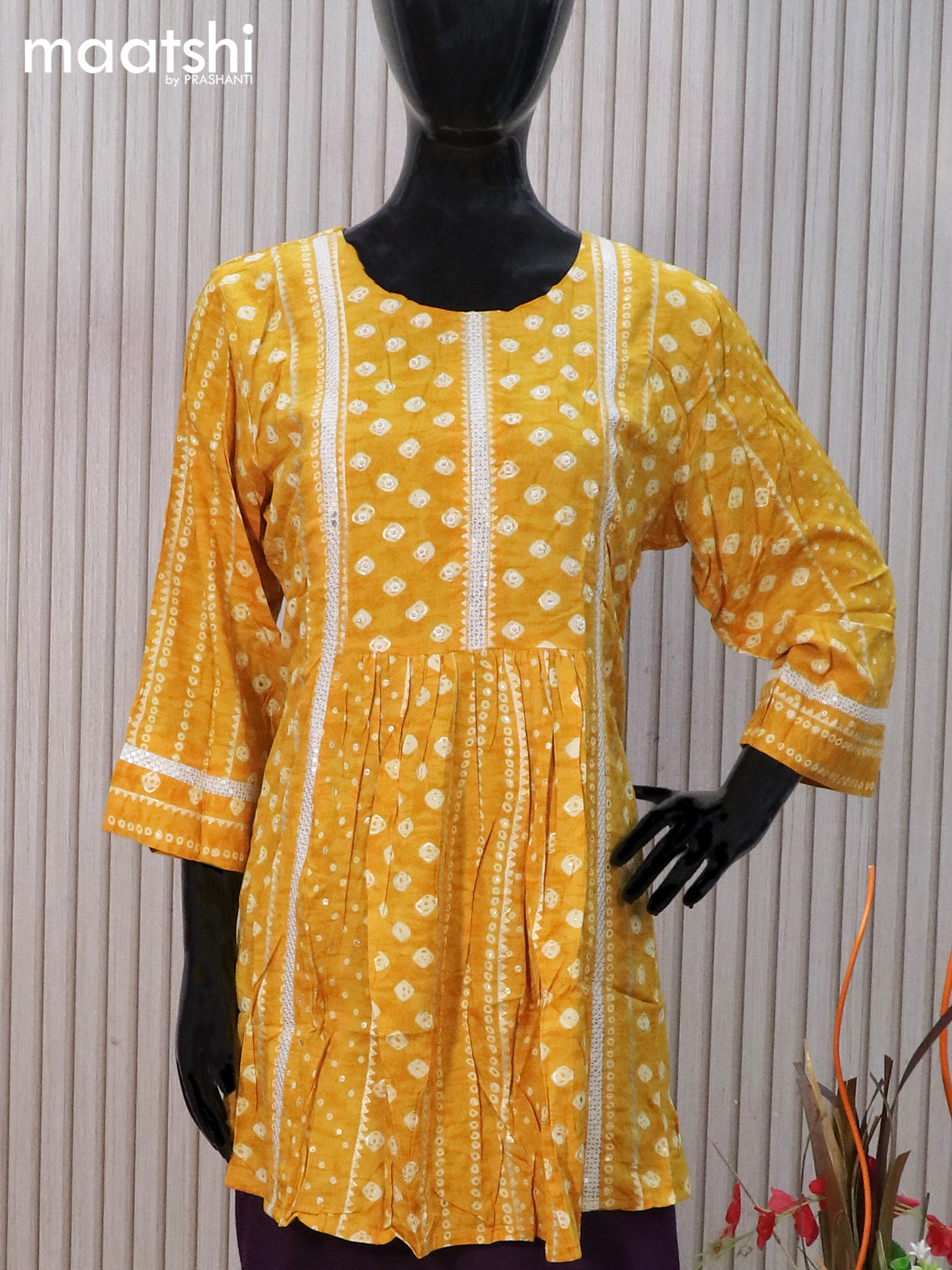 Cotton readymade tunic top mustard yellow with allover bandhani prints & beaded sequin work neck pattern without pant