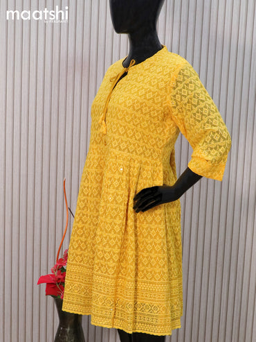 Semi georgette readymade tunic top yellow with allover chikankari work & simple neck pattern without pant