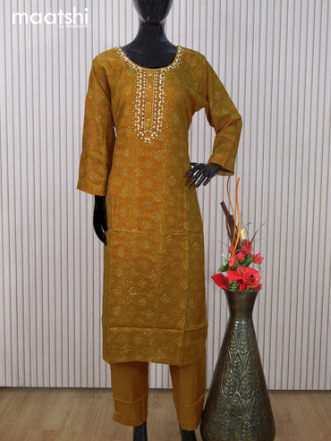 Muslin readymade salwar suit dark mustard with allover prints & mirror embroidery work neck pattern and straight cut pant & dupatta