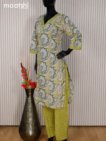 Cotton readymade kurti set green shade with allover prints & v neck pattern and straight cut pant