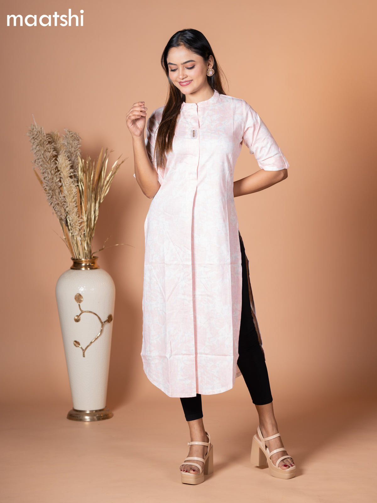 Rayon kurti off white and pastel pink with allover prints & simple neck pattern without pant