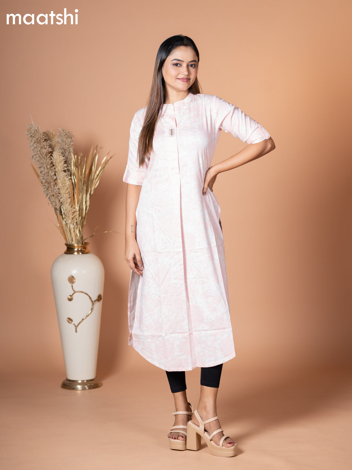 Rayon kurti off white and pastel pink with allover prints & simple neck pattern without pant