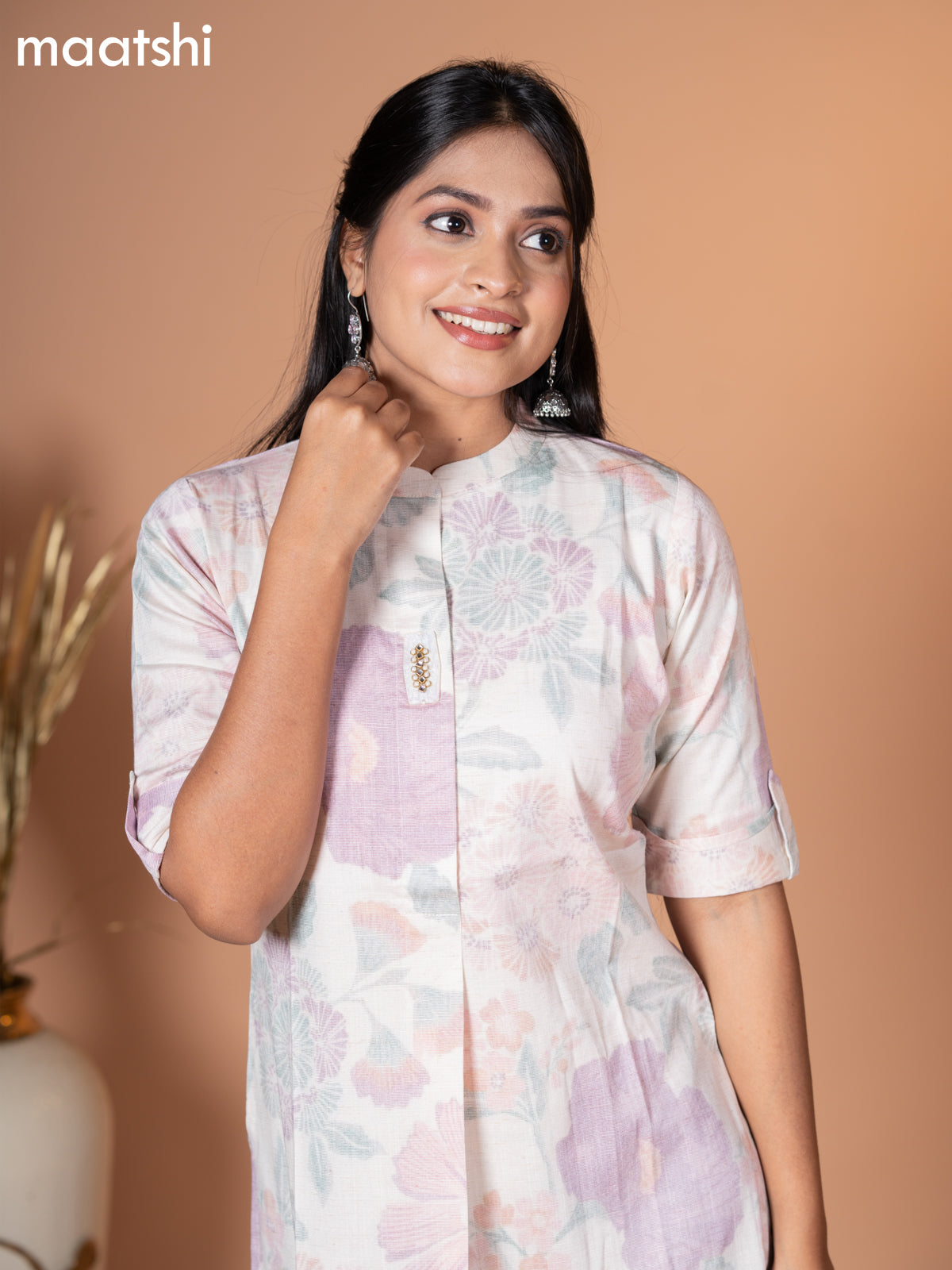 Rayon kurti off white with allover leaf prints & simple neck pattern without pant