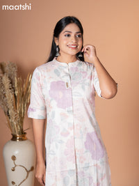 Rayon kurti off white with allover leaf prints & simple neck pattern without pant