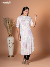 Rayon kurti off white with allover leaf prints & simple neck pattern without pant