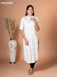 Rayon kurti cream with allover floral prints & simple neck pattern without pant