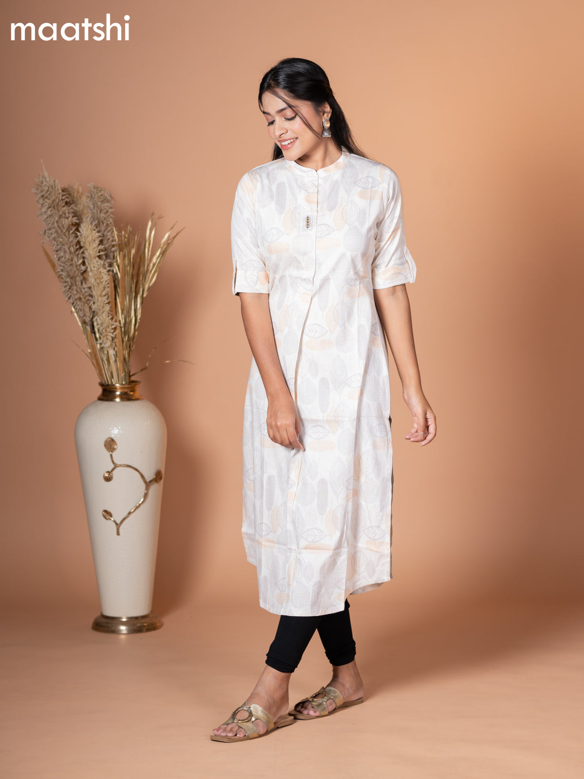 Rayon kurti cream with allover floral prints & simple neck pattern without pant