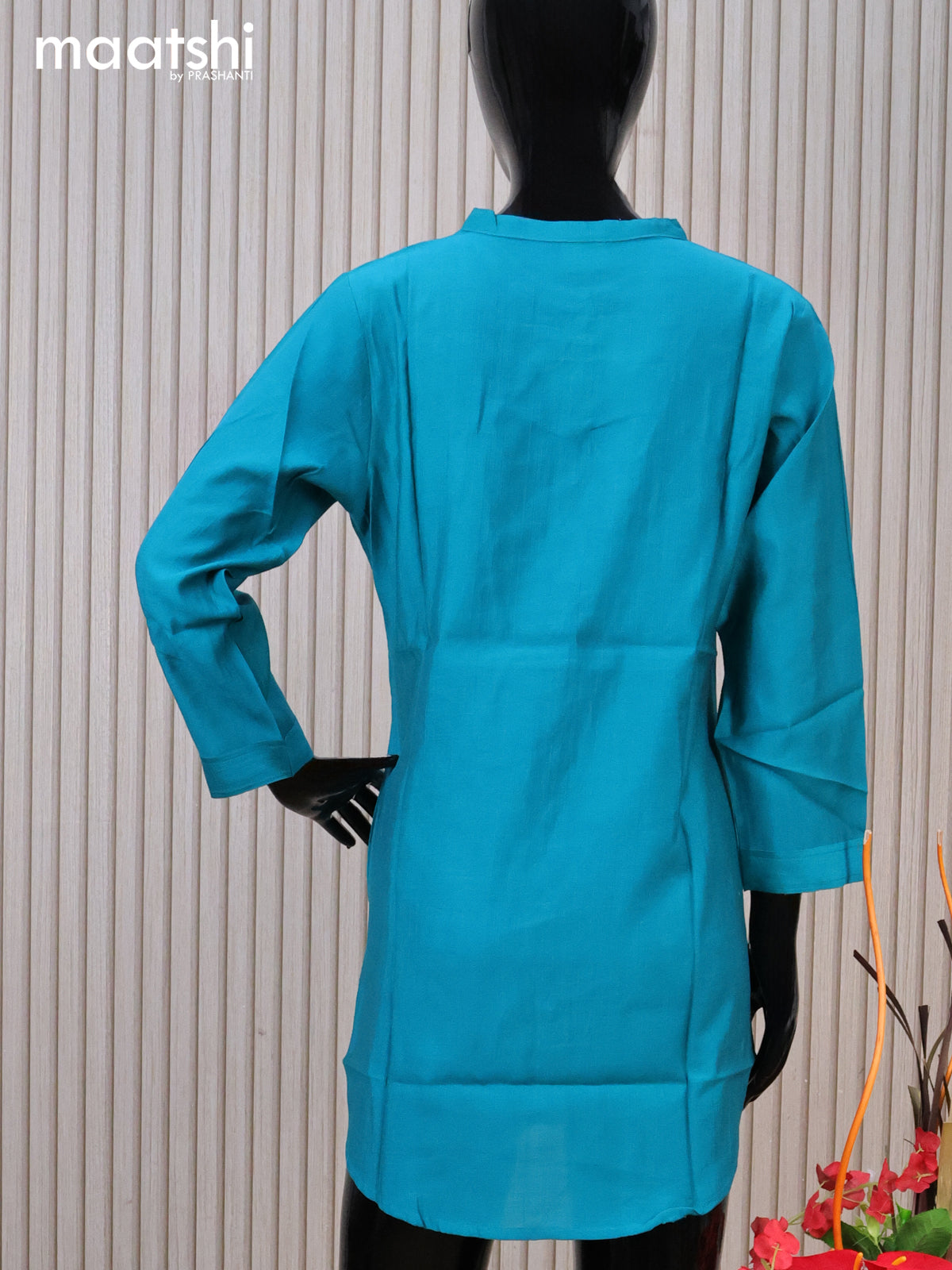 Rayon readymade short kurti teal blue with plain body & simple neck pattern without pant