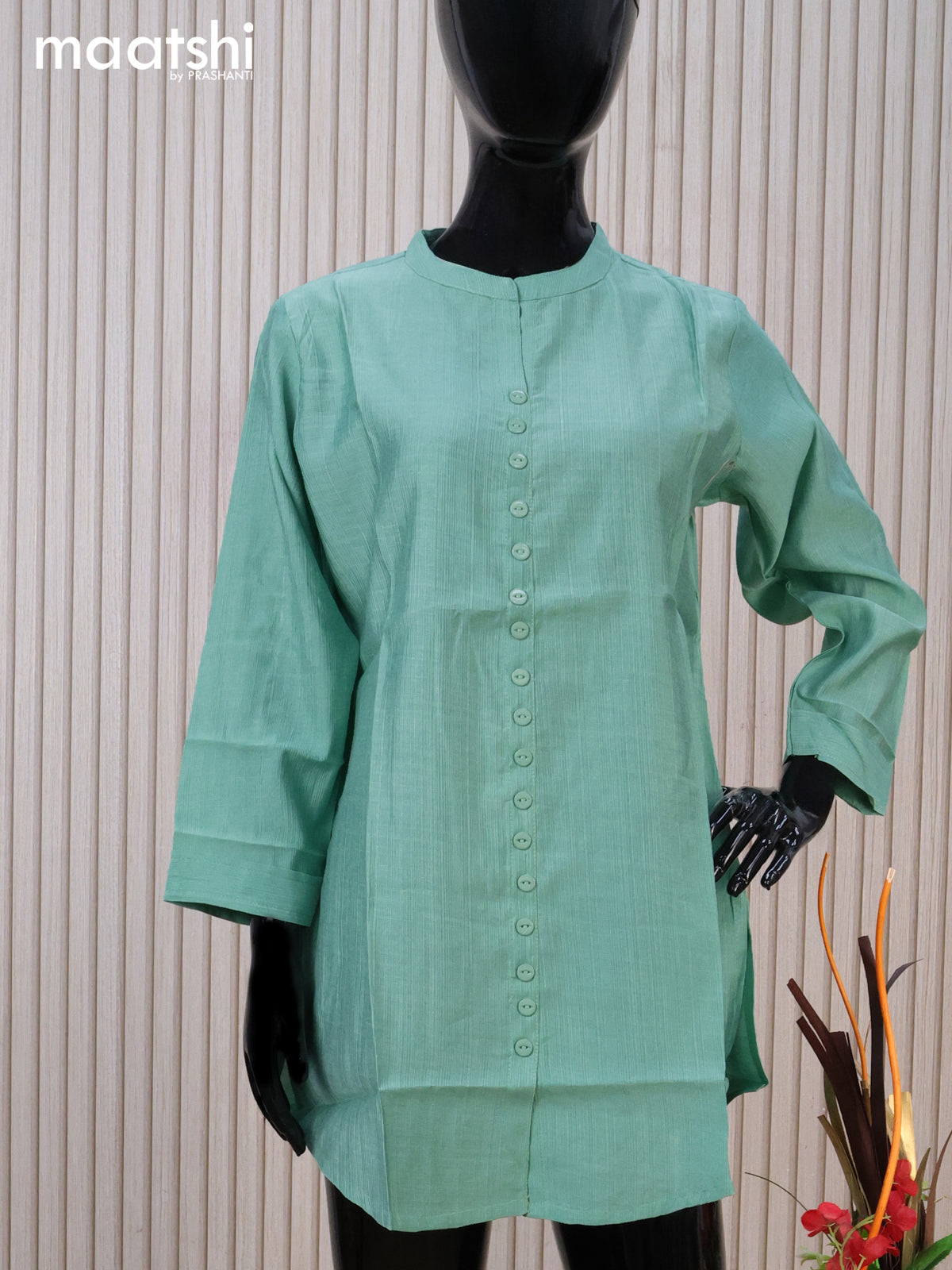 Rayon readymade short kurti pastel green with plain body & simple neck pattern without pant