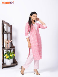 Cotton readymade kurti set light pink and off white with allover floral prints & patch work neck pattern and straight cut pant