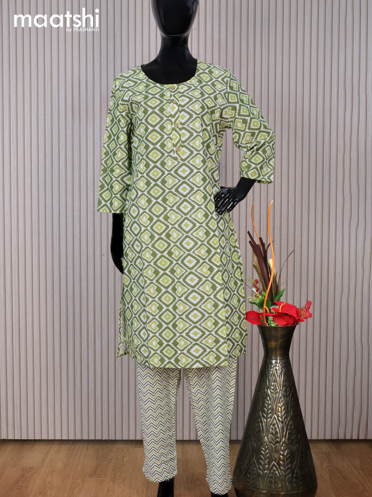 Cotton readymade kurti set sap green and off white with allover ikat prints & simple neck pattern and straight cut pant