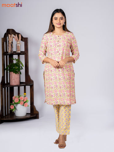 Cotton readymade kurti set pale yellow and pink with allover floral prints & simple neck pattern and straight cut pant