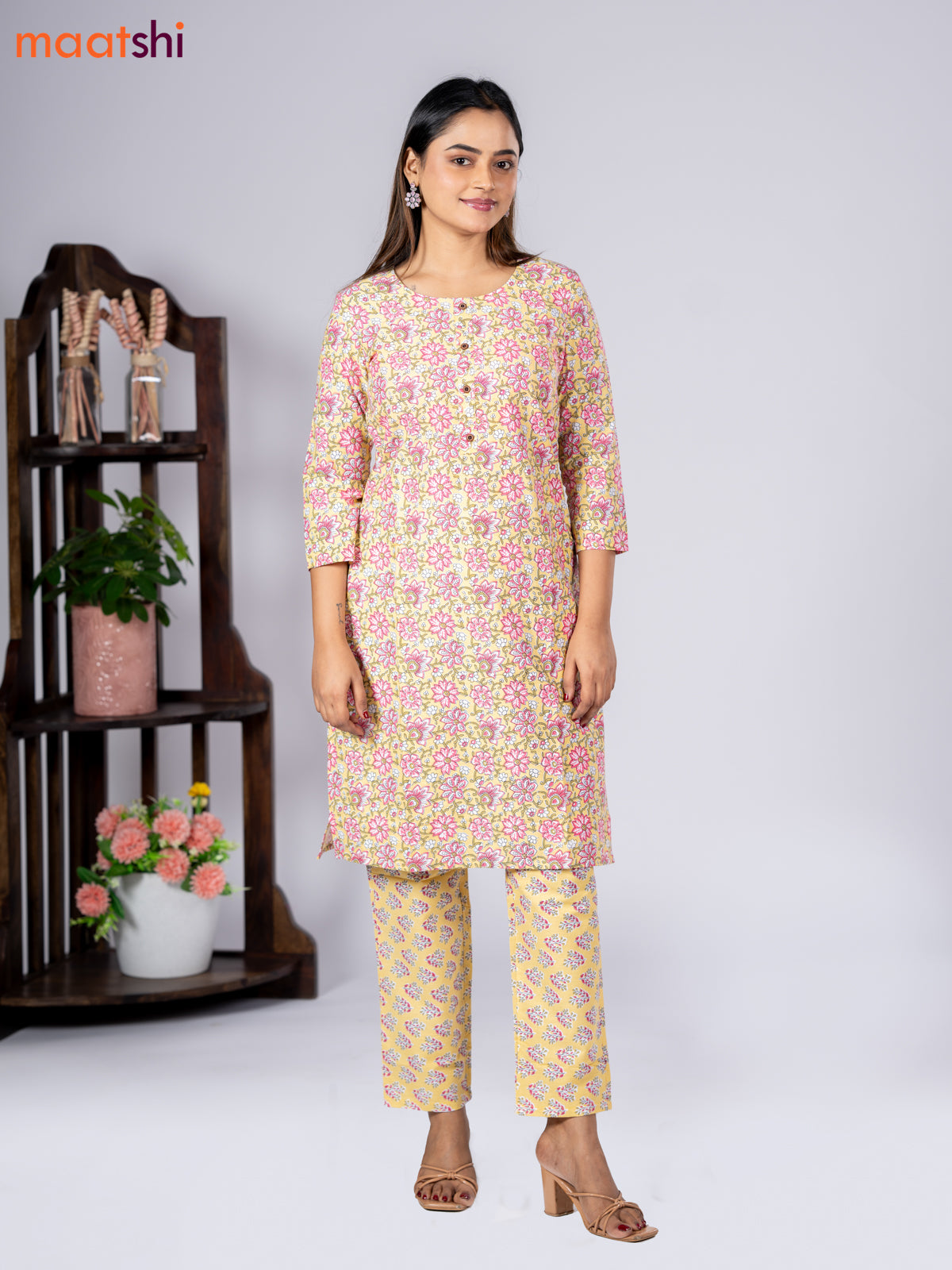 Cotton readymade kurti set pale yellow and pink with allover floral prints & simple neck pattern and straight cut pant