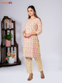 Cotton readymade kurti set pale yellow and pink with allover floral prints & simple neck pattern and straight cut pant