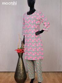 Cotton readymade kurti set green and pink with allover floral prints & simple neck pattern and straight cut pant