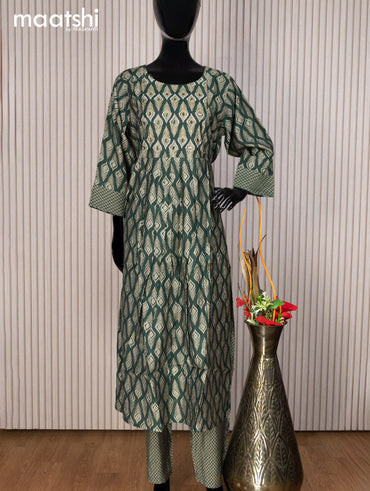 Muslin readymade naira cut salwar suit green with allover prints & mirror work neck pattern and straight cut pant & dupatta