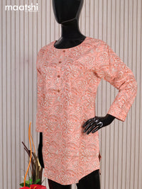 Cotton readymade short kurti peack shade with allover floral prints & simple work neck pattern without pant