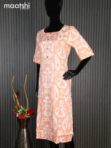 Rayon readymade kurti orange and off white with allover ikat prints & simple neck pattern without pant