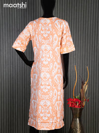 Rayon readymade kurti orange and off white with allover ikat prints & simple neck pattern without pant