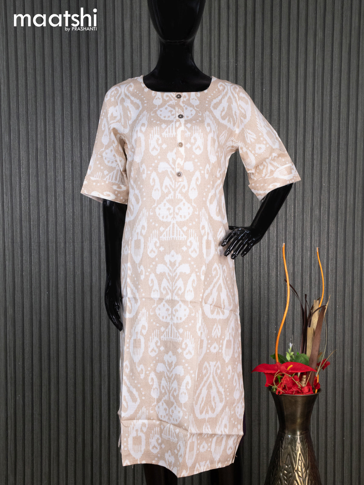 Rayon readymade kurti beige and off white with allover ikat prints & simple neck pattern without pant