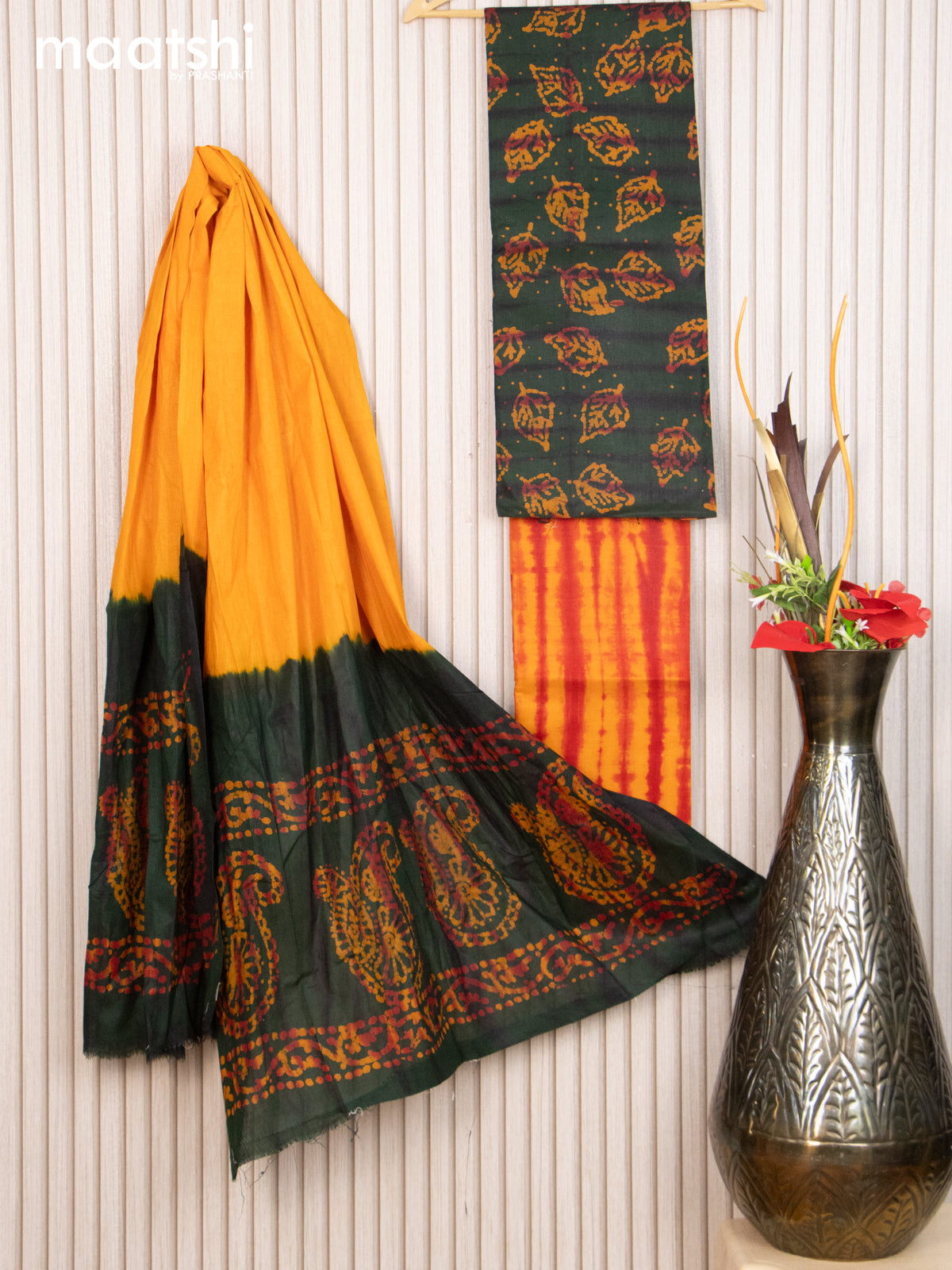 Cotton dress material green and mango yellow with allover leaf batik prints and bottom & dupatta