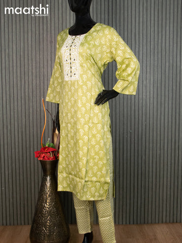 Rayon readymade kurti set light green and off white with allover prints & embroidery work neck pattern and straight cut pant