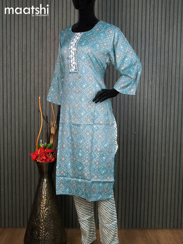 Rayon readymade kurti set teal blue and cream with allover floral prints & embroidery mirror work neck pattern and straight cut pant