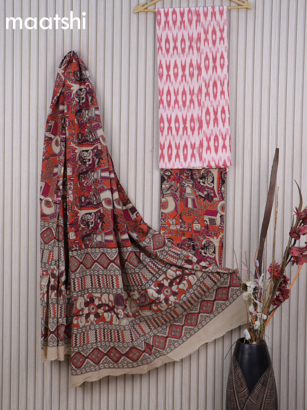 Cotton dress material off white red and orange with allover ikat buttas weaves and kalamkari bottom & dupatta