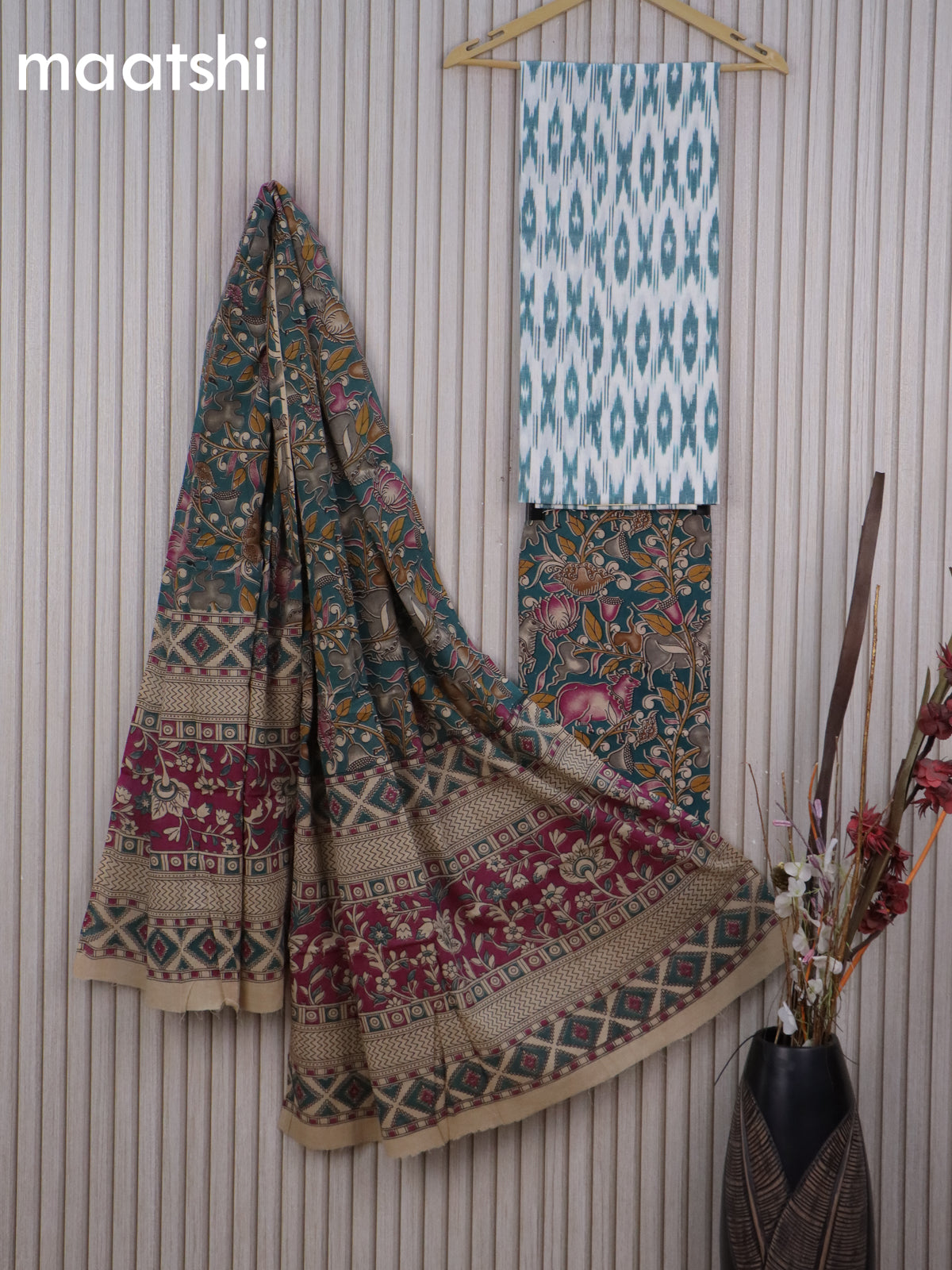 Cotton dress material cream and green with allover ikat weaves and kalamkari pichwai bottom & dupatta