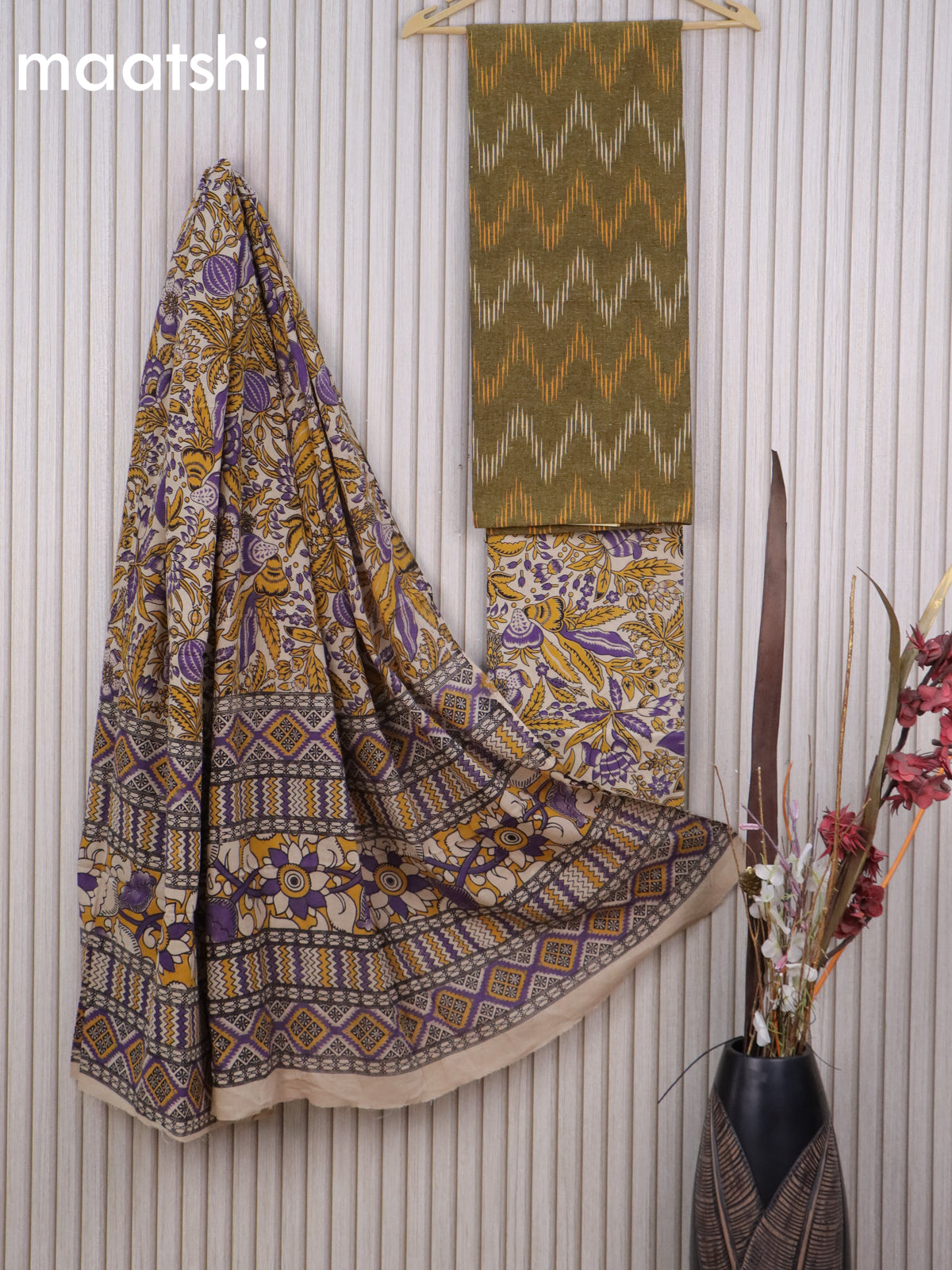 Cotton dress material mustard shade and beige with allover ikat weaves and kalamkari bottom & dupatta