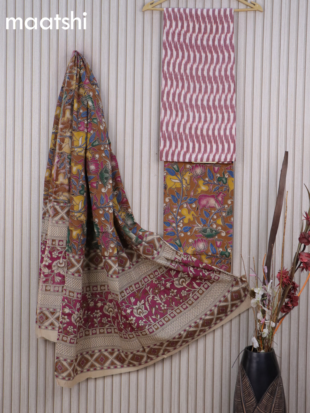 Cotton dress material off white maroon and dark mustard with allover ikat weaves and kalamkari pichwai bottom & dupatta