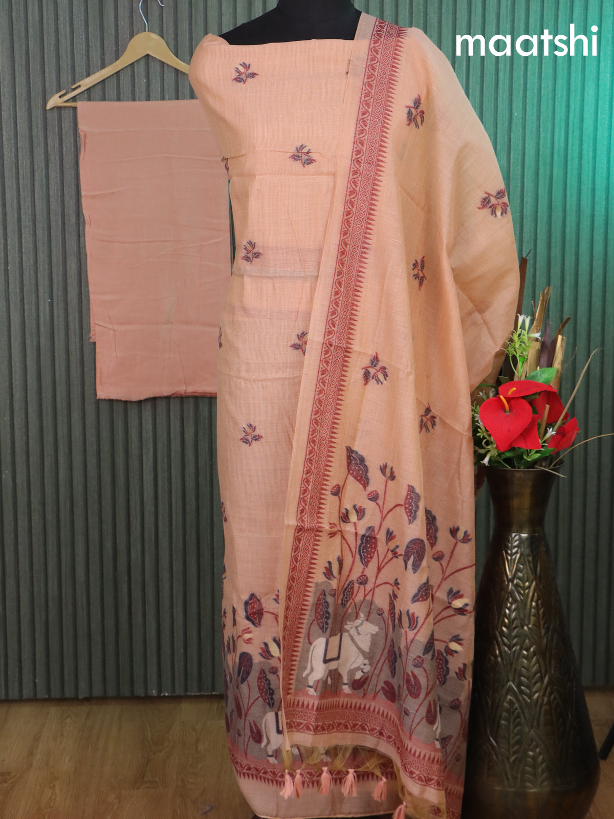 Munga cotton dress material pastel peach orange with thread & zari woven floral buttas and bottom & thread woven pichwai dupatta