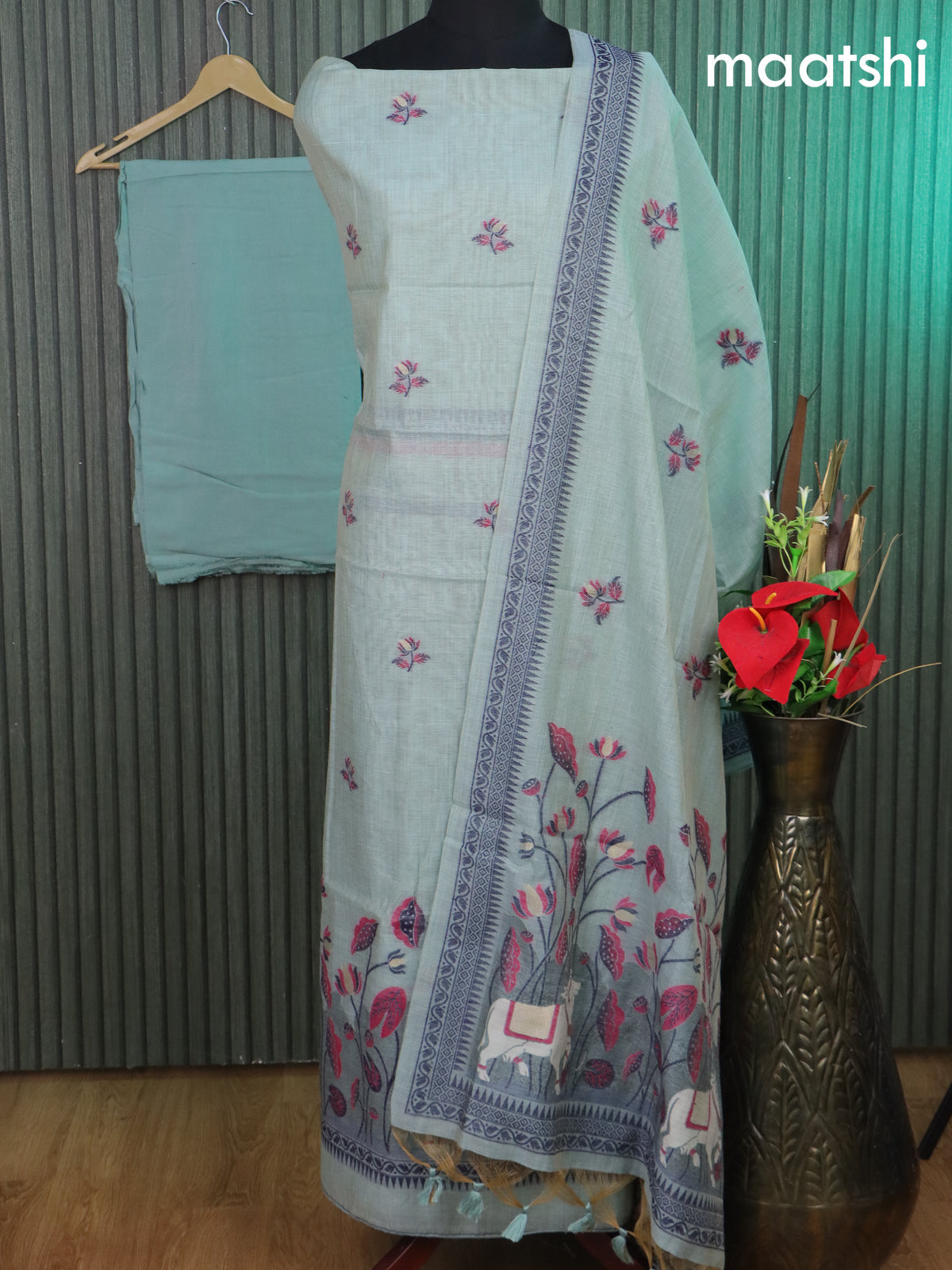 Munga cotton dress material pastel blue shade with thread & zari woven floral buttas and bottom & thread woven pichwai dupatta