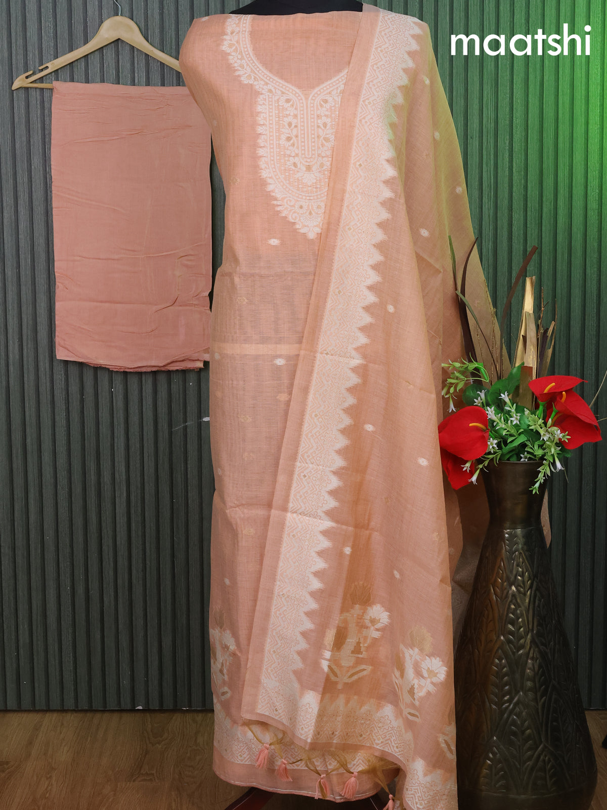 Munga cotton dress material pastel peach orange with woven buttas & simple neck pattern and bottom & thread woven dupatta