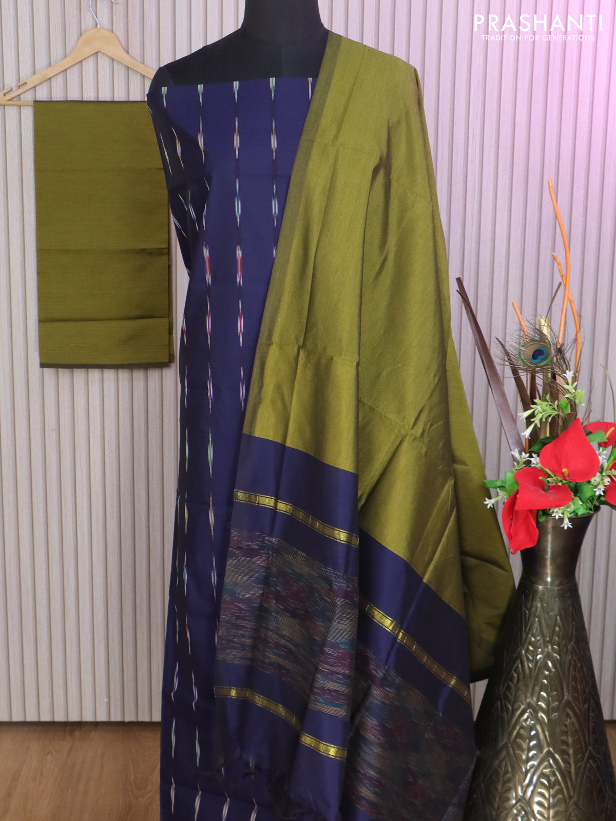 Ikat dress material dark blue and mehendi green with allover ikat weaves and bottom, dupatta