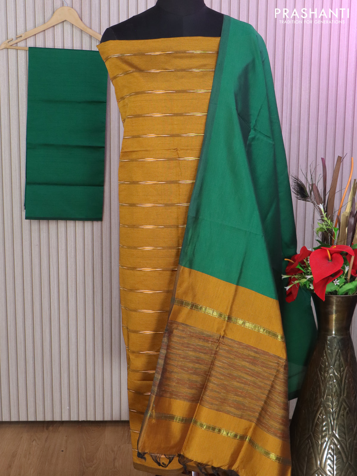 Ikat dress material dark mustard and green with allover ikat weaves and bottom, dupatta