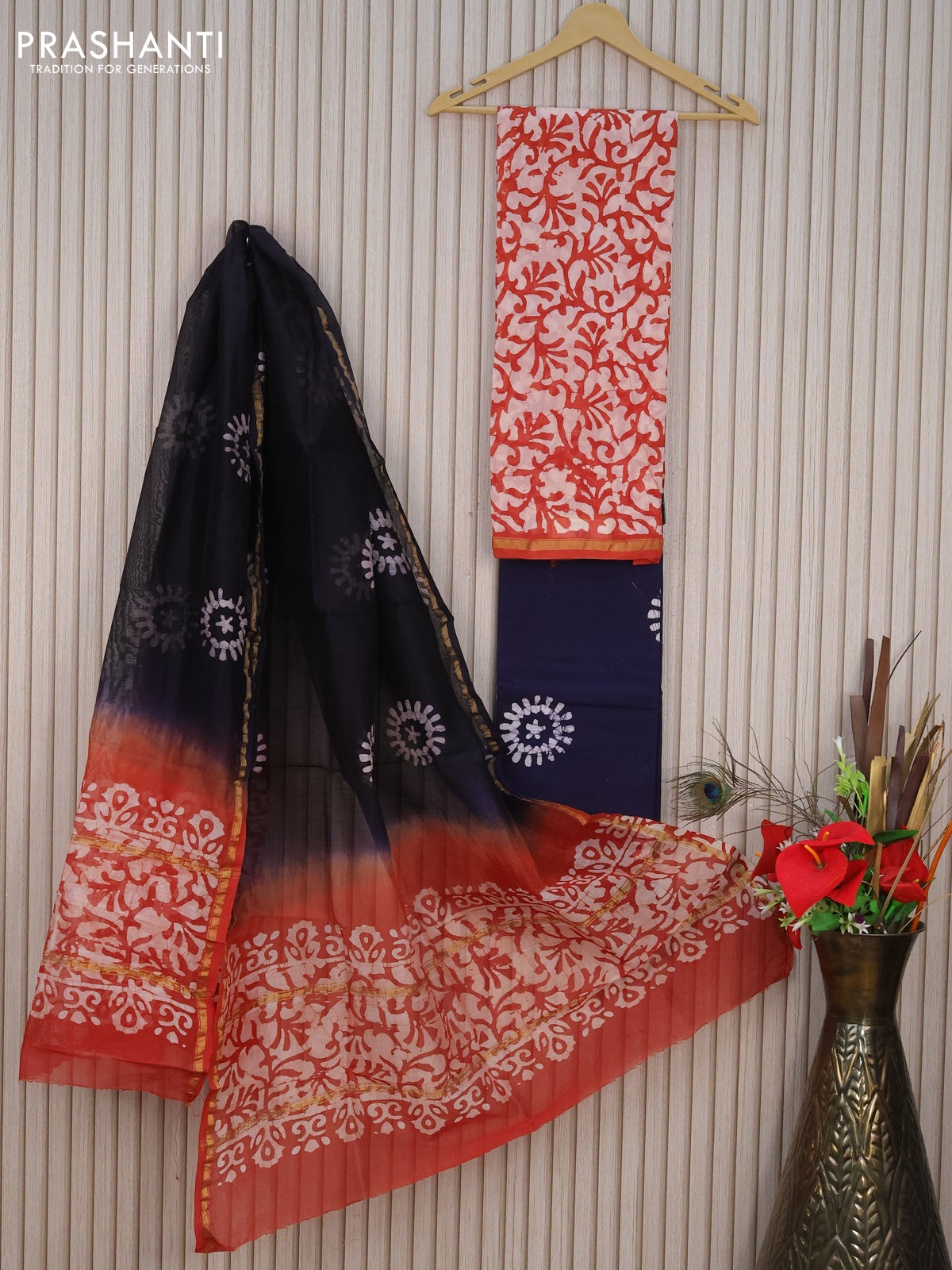 Pure chanderi dress material rustic orange and navy blue with allover batik prints and small zari woven border