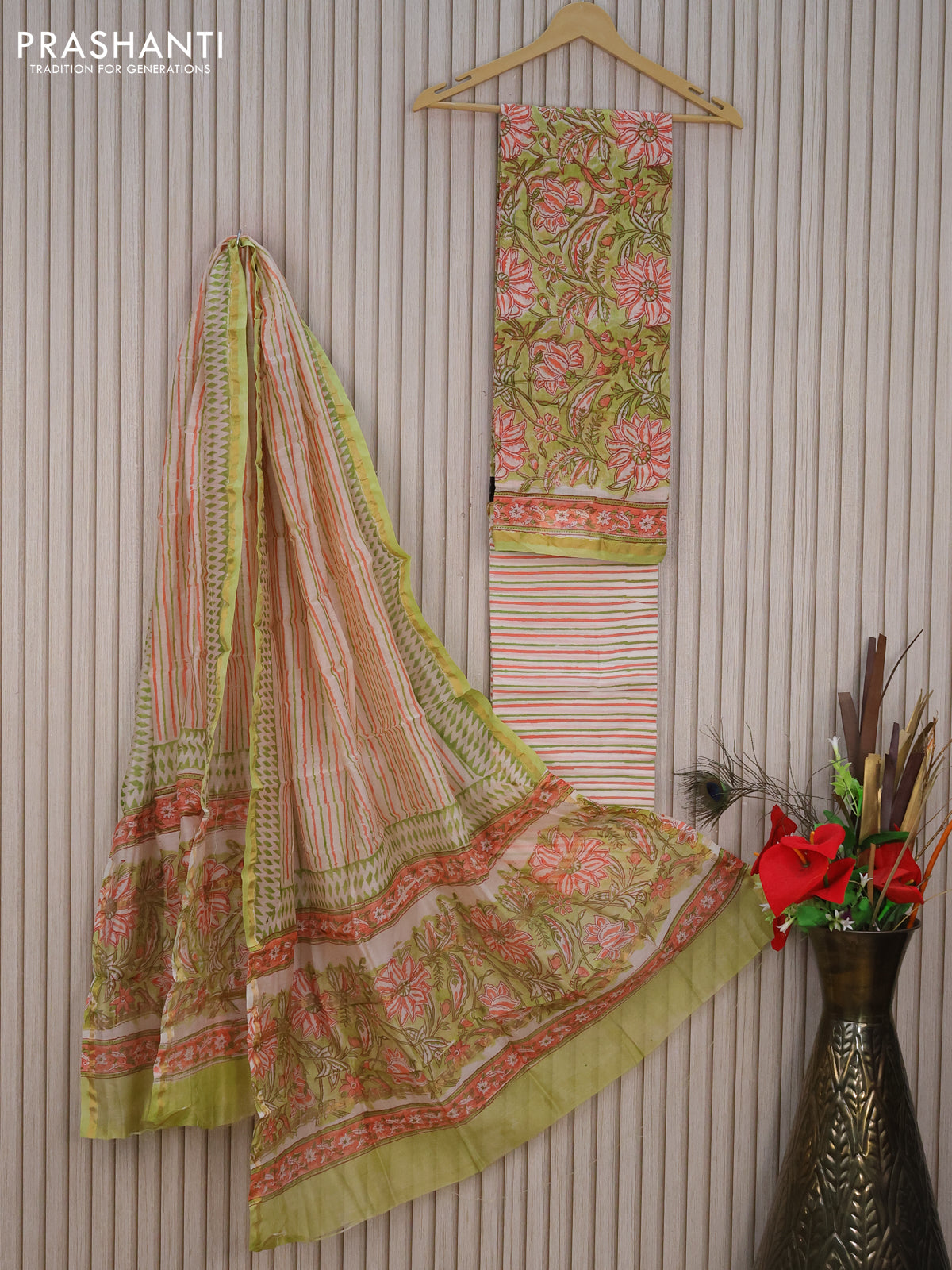 Pure chanderi dress material pista green and off white with allover kalamkari prints and small zari woven border