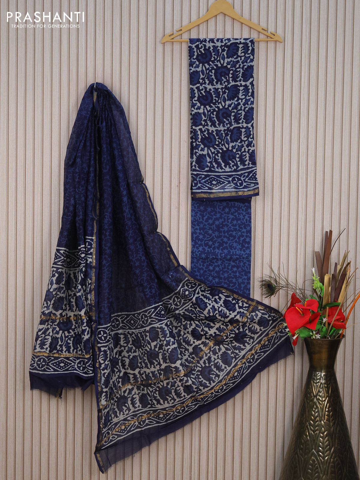 Pure chanderi dress material indigo blue with allover prints and small zari woven border