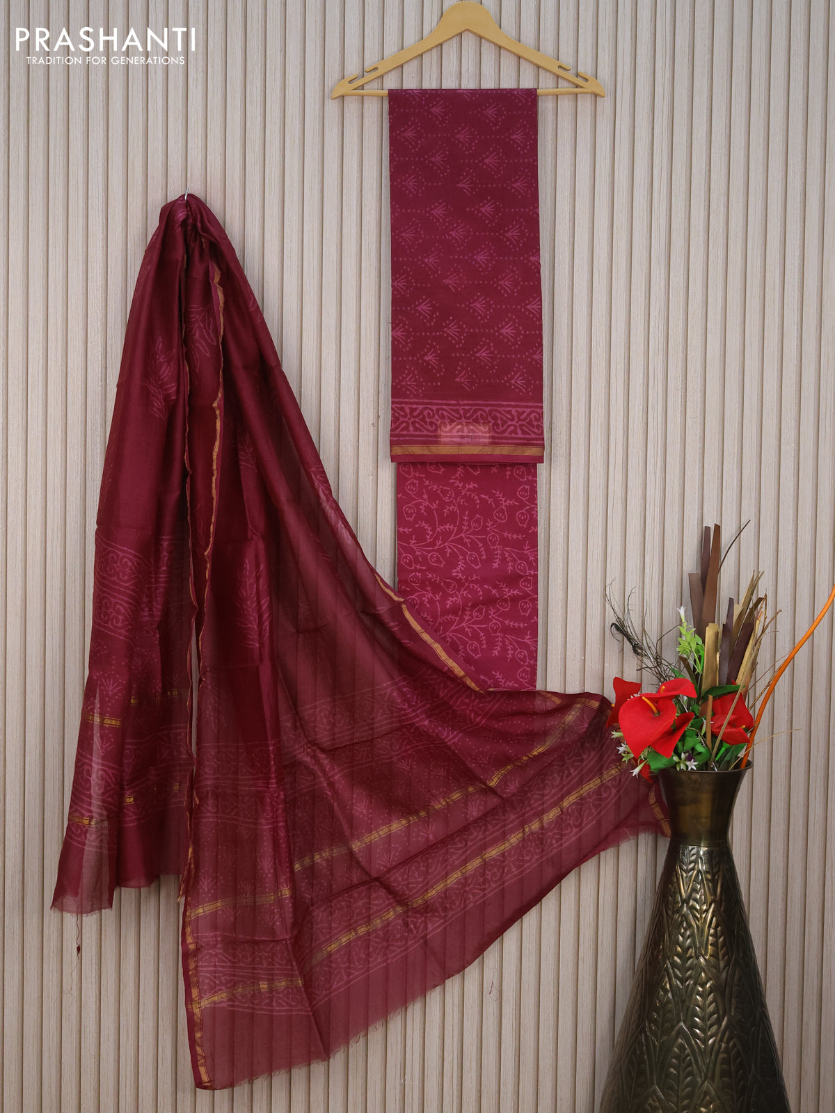 Pure chanderi dress material maroon with allover prints and small zari woven border