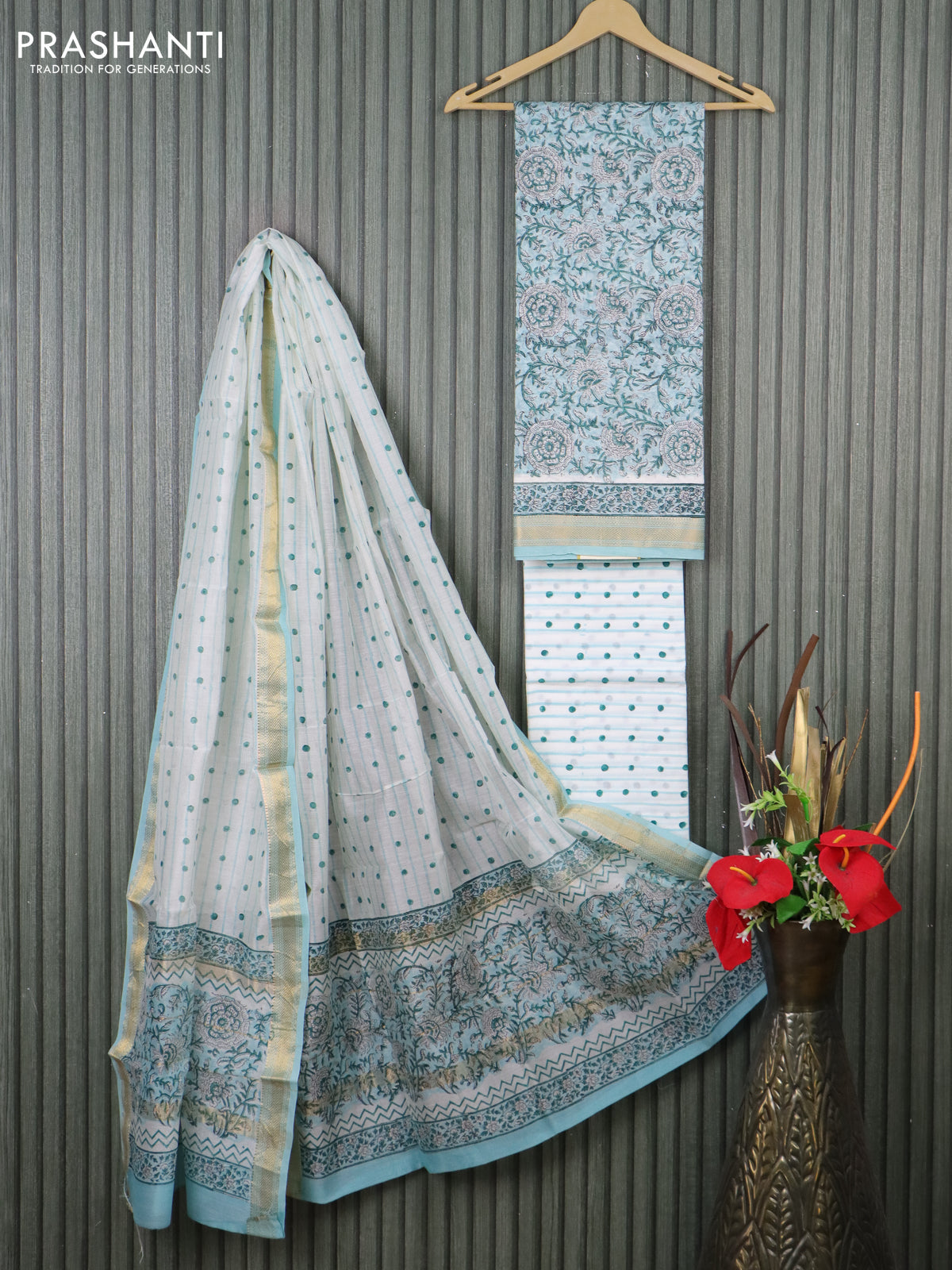 Chanderi dress material teal blue and off white with allover floral prints and maheshwari zari border