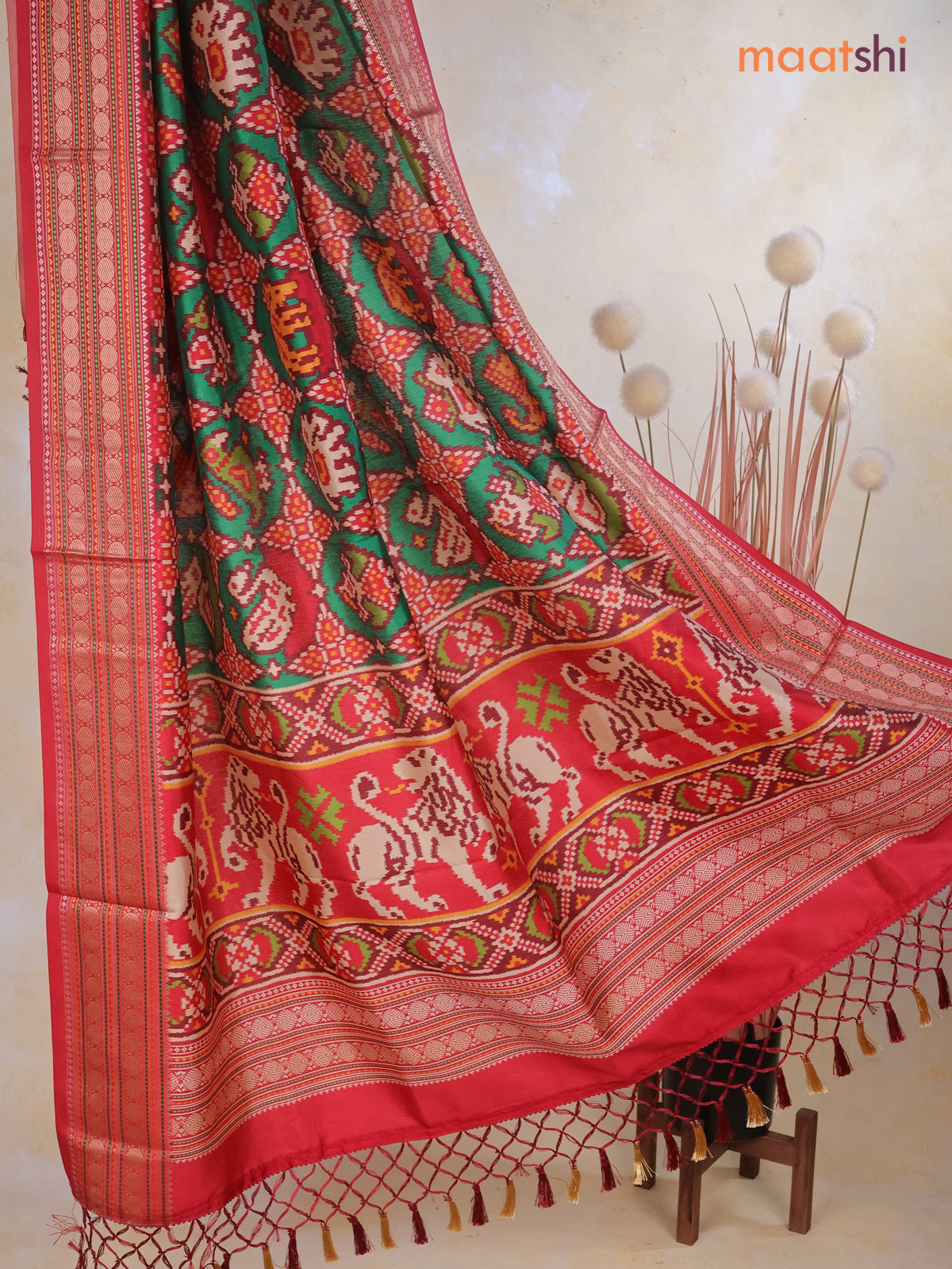 Tussar Ikat dupattas green and kumkum red with allover patola prints and thread woven border