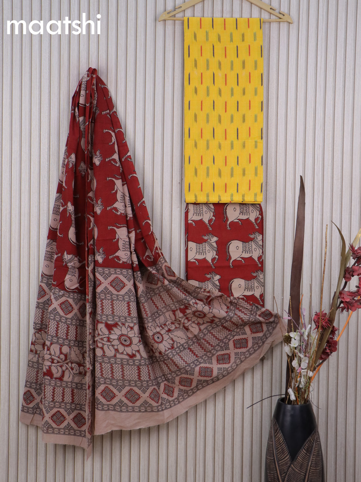 Cotton dress material yellow and maroon with allover ikat weaves and kalamkari pichwai bottom & dupatta