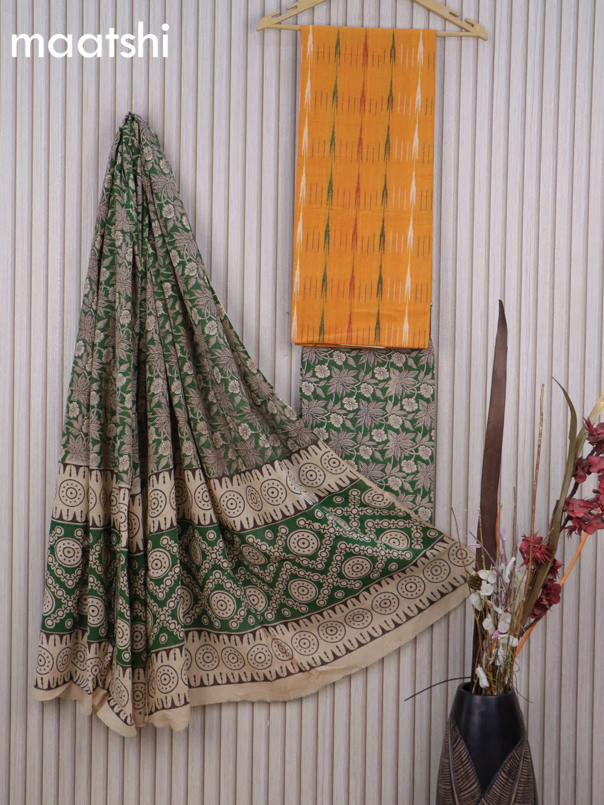 Cotton dress material mango yellow and green with allover ikat weaves and kalamkari bottom & dupatta