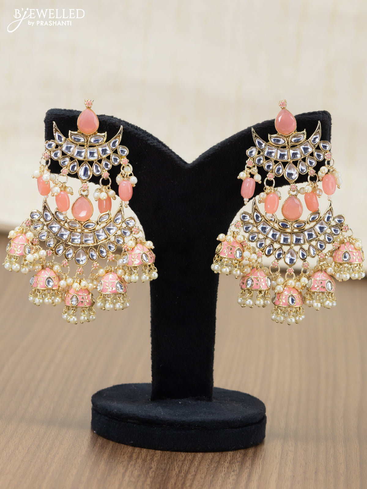 Light weight earrings peach and kundan stones with pearl maatal