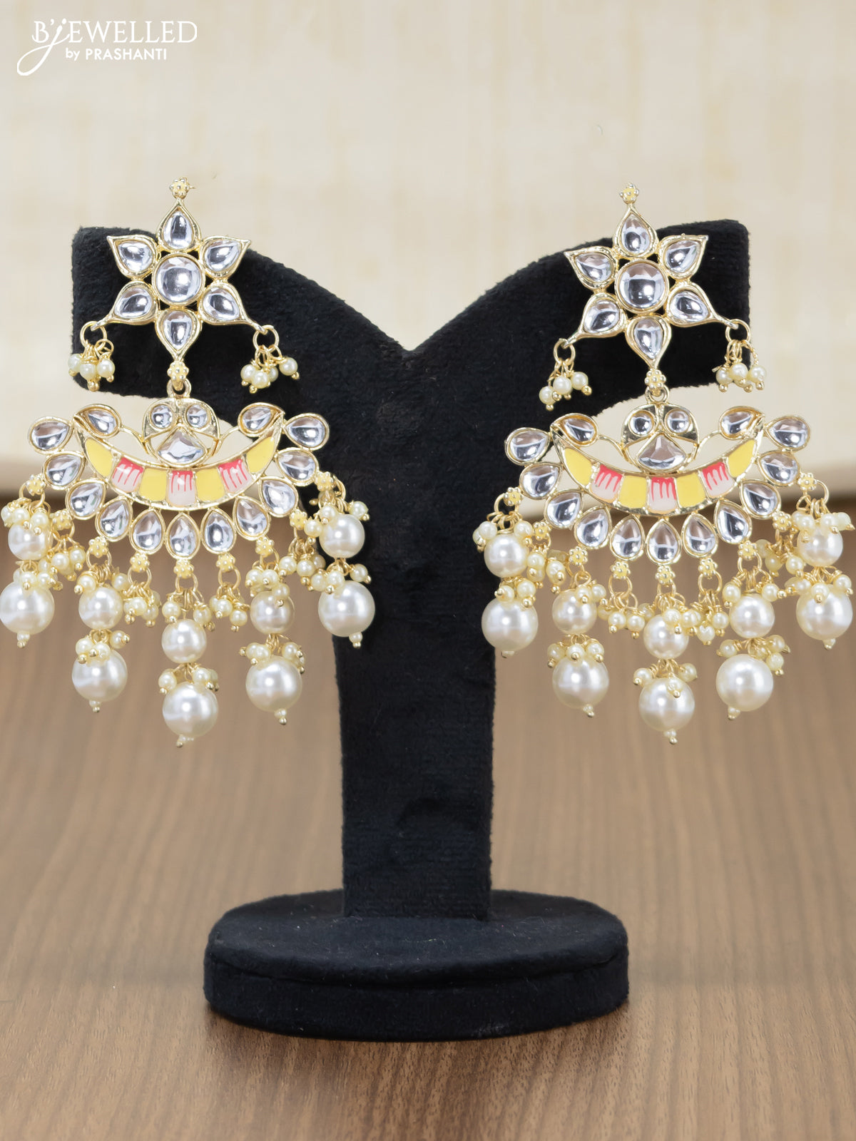 Light weight minakari cream earrings with pearl maatal