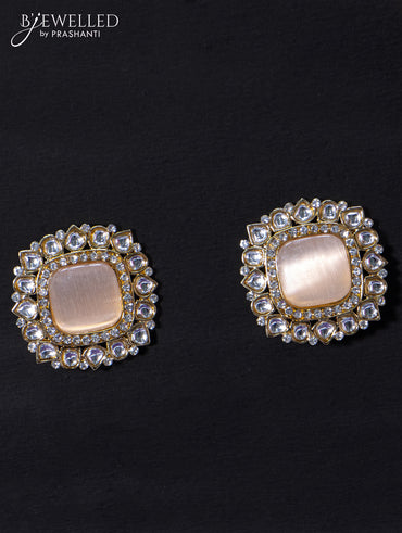 Light weight earrings with cz and peach stone