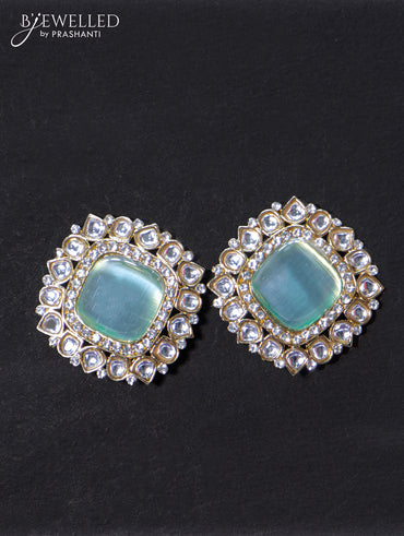 Light weight earrings with cz and mint green stone