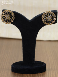 Light weight floral design earrings with cz and black stone