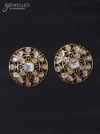 Light weight floral design earrings with cz and white stone